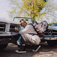 SPRAYGROUND® BACKPACK SCORCHING MONEY FEATHERS BACKPACK