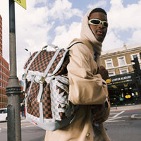 SPRAYGROUND® BACKPACK CREAM AND BROWN TEAR CHECK MONTE CARLO