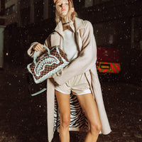 SPRAYGROUND® DUFFLE CREAM AND BROWN TEAR CHECK MINI DUFFLE