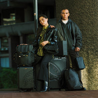 SPRAYGROUND® LUGGAGE SPRITZ BLACK CARRY-ON LUGGAGE