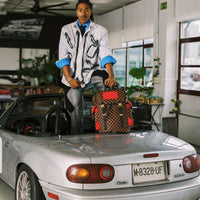 SPRAYGROUND® BACKPACK RED REDEMPTION MONTE CARLO BACKPACK