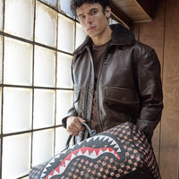 SPRAYGROUND® DUFFLE PEEKING CHARACTERS REMIX DUFFLE