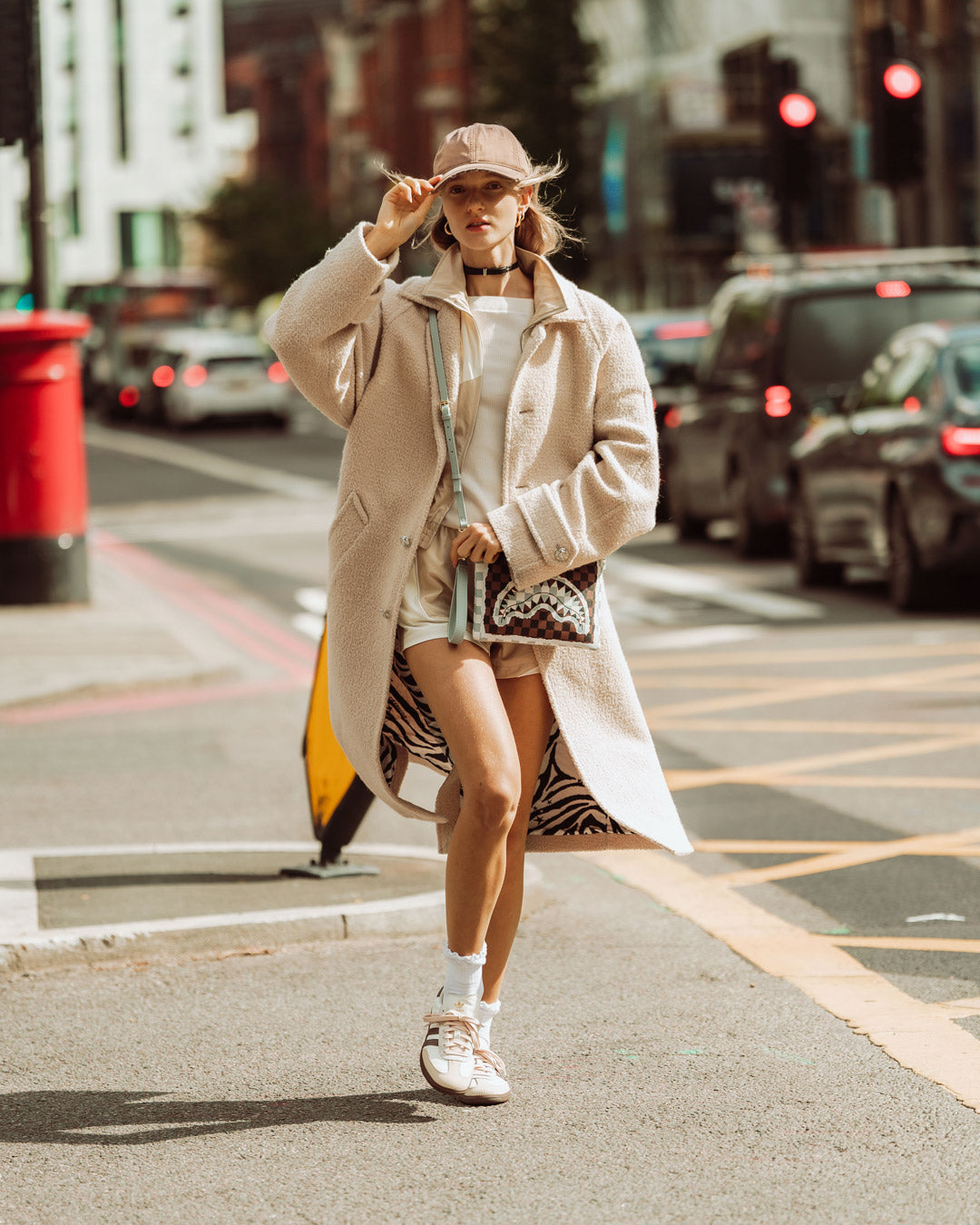 SPRAYGROUND® POUCHETTE CREAM AND BROWN TEAR CHECK CROSSOVER CLUTCH