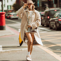 SPRAYGROUND® POUCHETTE CREAM AND BROWN TEAR CHECK CROSSOVER CLUTCH