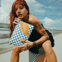 SPRAYGROUND® POUCHETTE LETTER CHECKERS CROSSOVER CLUTCH