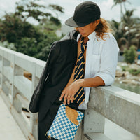 SPRAYGROUND® POUCHETTE LETTER CHECKERS CROSSOVER CLUTCH