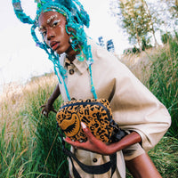 SPRAYGROUND® SLING CHEETAH CHENILLE BACKPACK SLING