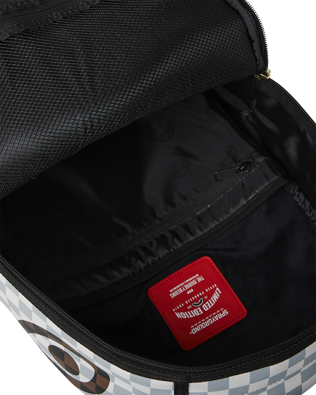 SPRAYGROUND® BACKPACK CREAM AND BROWN TEAR CHECK BACKPACK