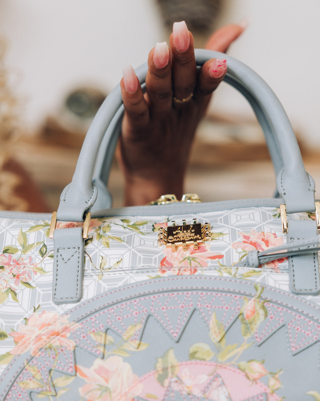 A.I. AFRICAN INTELLIGENCE ELEGANT ENERGY MINI DUFFLE - SANDFLOWER