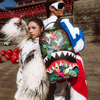 SPRAYGROUND® BACKPACK SLOTH SHARKS IN PARIS DLXSV BACKPACK