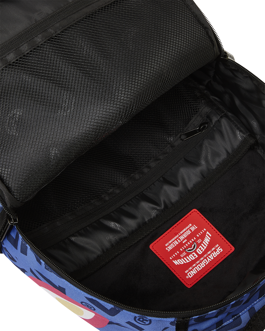 SPRAYGROUND® BACKPACK MEG SHARK MOUTH DLXR BACKPACK