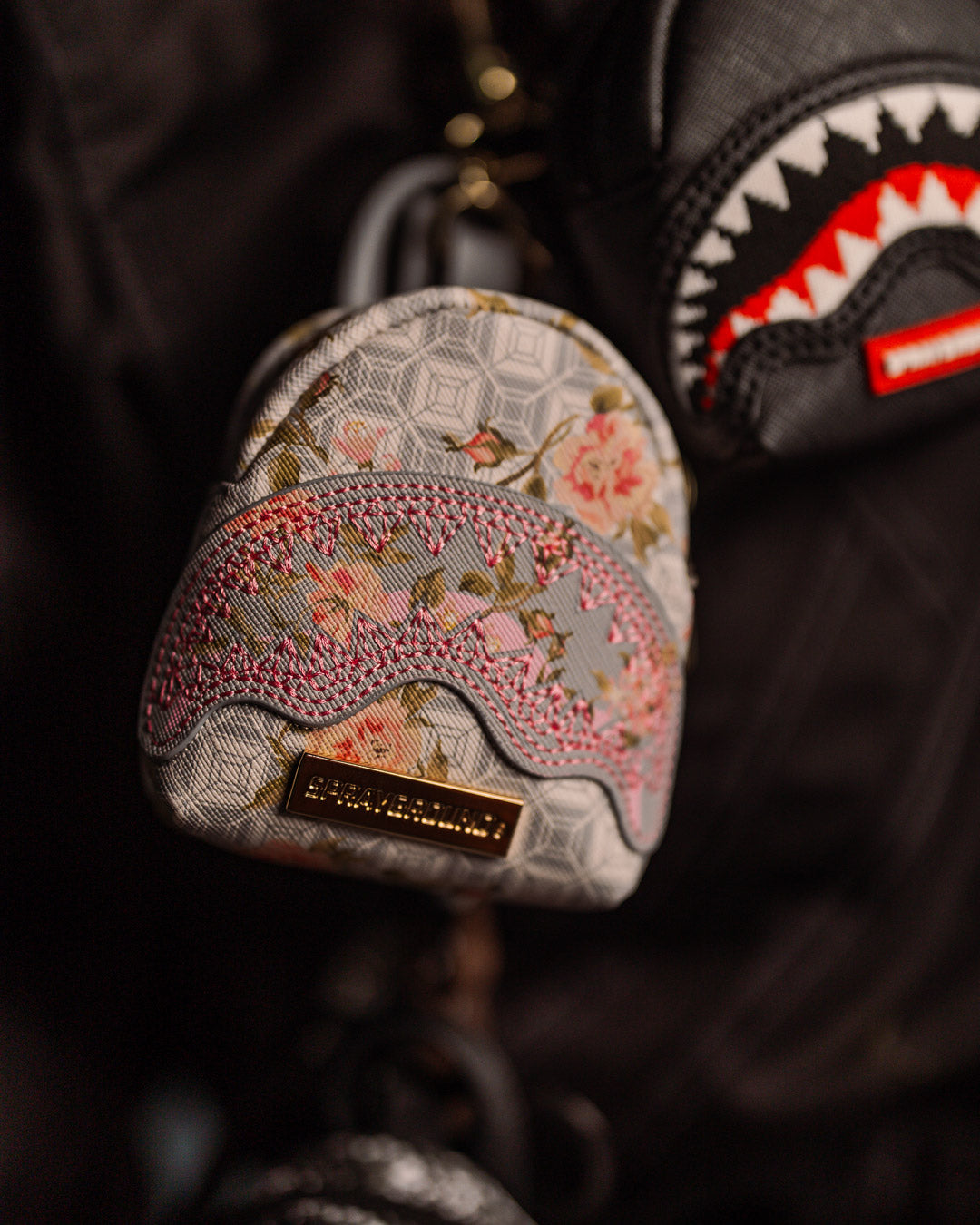 SPRAYGROUND® KEYCHAIN A.I. AFRICAN INTELLIGENCE ELEGANT ENERGY BACKPACK KEYCHAIN