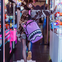 SPRAYGROUND® BACKPACK PINK AND BLACK DRIP CHECK DLXSV BACKPACK