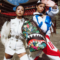 SPRAYGROUND® BACKPACK SLOTH SHARKS IN PARIS DLXSV BACKPACK