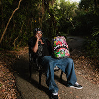SPRAYGROUND® BACKPACK SPRAYGROUND CHARACTER MASH DLXR BACKPACK