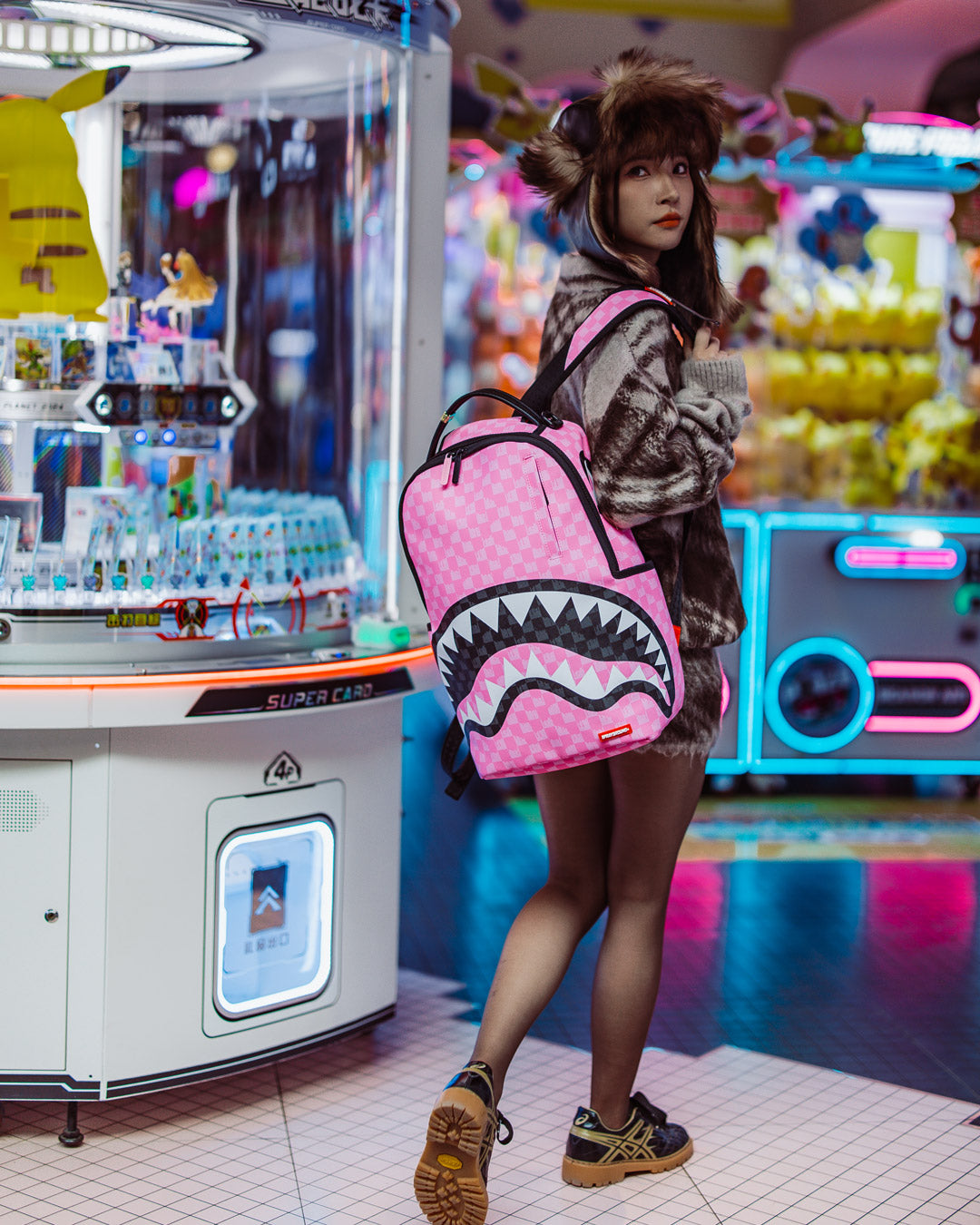 SPRAYGROUND® BACKPACK PINK AND BLACK DRIP CHECK DLXSV BACKPACK