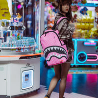 SPRAYGROUND® BACKPACK PINK AND BLACK DRIP CHECK DLXSV BACKPACK