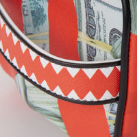 SPRAYGROUND® TOILETRY MONEY CAMO (RED) TOILETRY BAG