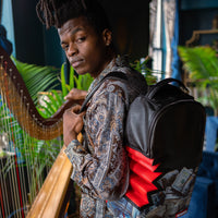 SPRAYGROUND® BACKPACK $HARKBITE DLXV BACKPACK