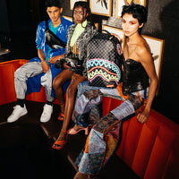 SPRAYGROUND® BACKPACK SHARKS IN PARIS GLOW BACKPACK (DLXV)