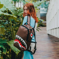 SPRAYGROUND® BACKPACK SHARKS AND SKULLS BACKPACK (DLXV)