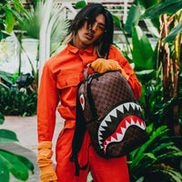 SPRAYGROUND® BACKPACK SHARKS AND SKULLS BACKPACK (DLXV)