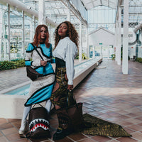 SPRAYGROUND® BACKPACK SHARKS AND SKULLS BACKPACK (DLXV)