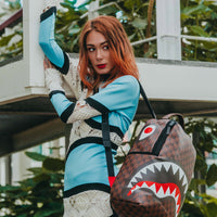SPRAYGROUND® BACKPACK SHARKS AND SKULLS BACKPACK (DLXV)