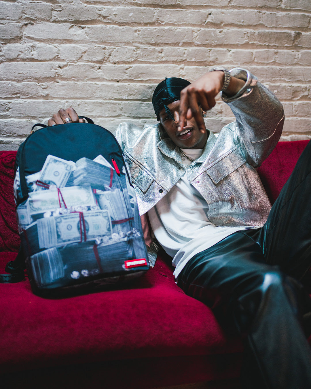 Sprayground money discount rolled backpack