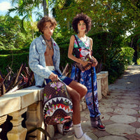 SPRAYGROUND® POUCHETTE GARDEN OF SHARKS CROSSOVER CLUTCH