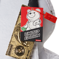 SPRAYGROUND® BACKPACK SPLIT THE CHECK (PEARL) MONEYBEAR TEDDYBEAR BACKPACK