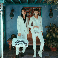 SPRAYGROUND® SLING SPLIT THE CHECK (PEARL) SLING