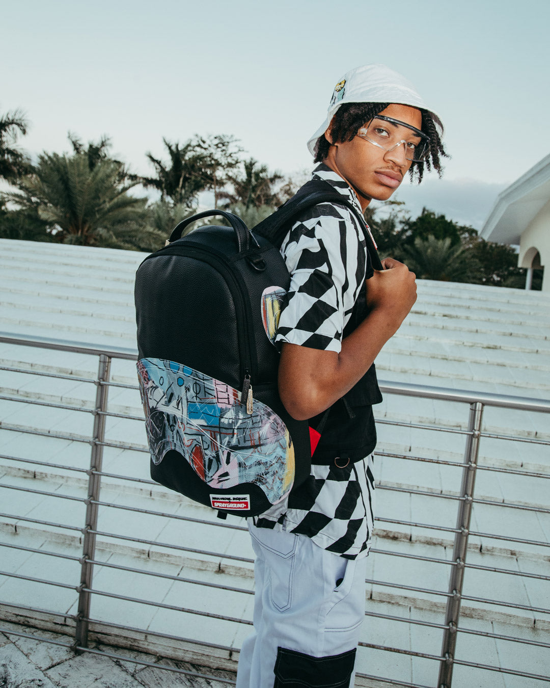 SPRAYGROUND® BACKPACK OFFICIAL BASQUIAT UNTITLED 1982 BACKPACK (DLXV)