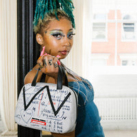 SPRAYGROUND® HANDBAG OFFICIAL BASQUIAT UNTITLED (CHEESE POPCORN) 1983 HANDBAG