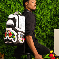 SPRAYGROUND® BACKPACK THE FLORAL CUT BACKPACK (DLXV)
