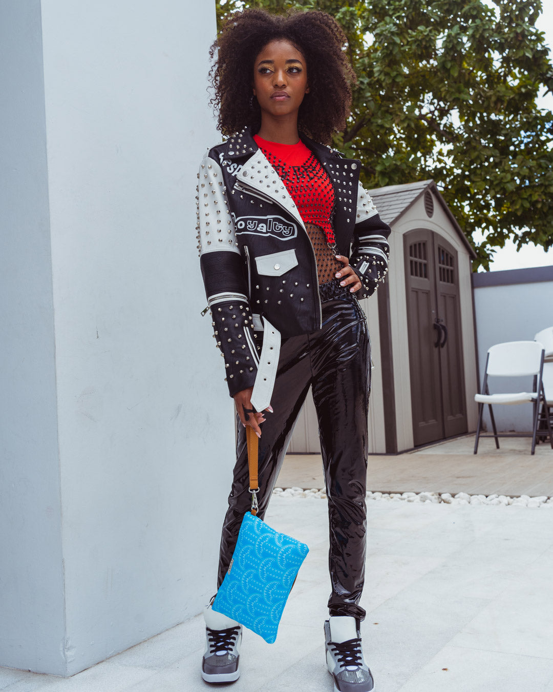 ILLUCHAINS TURQ CROSSOVER CLUTCH – SPRAYGROUND®