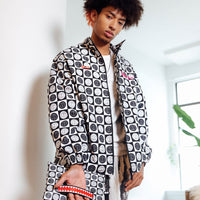 SPRAYGROUND® POUCHETTE POODLE CHECK RON ENGLISH COLLAB POUCHETTE