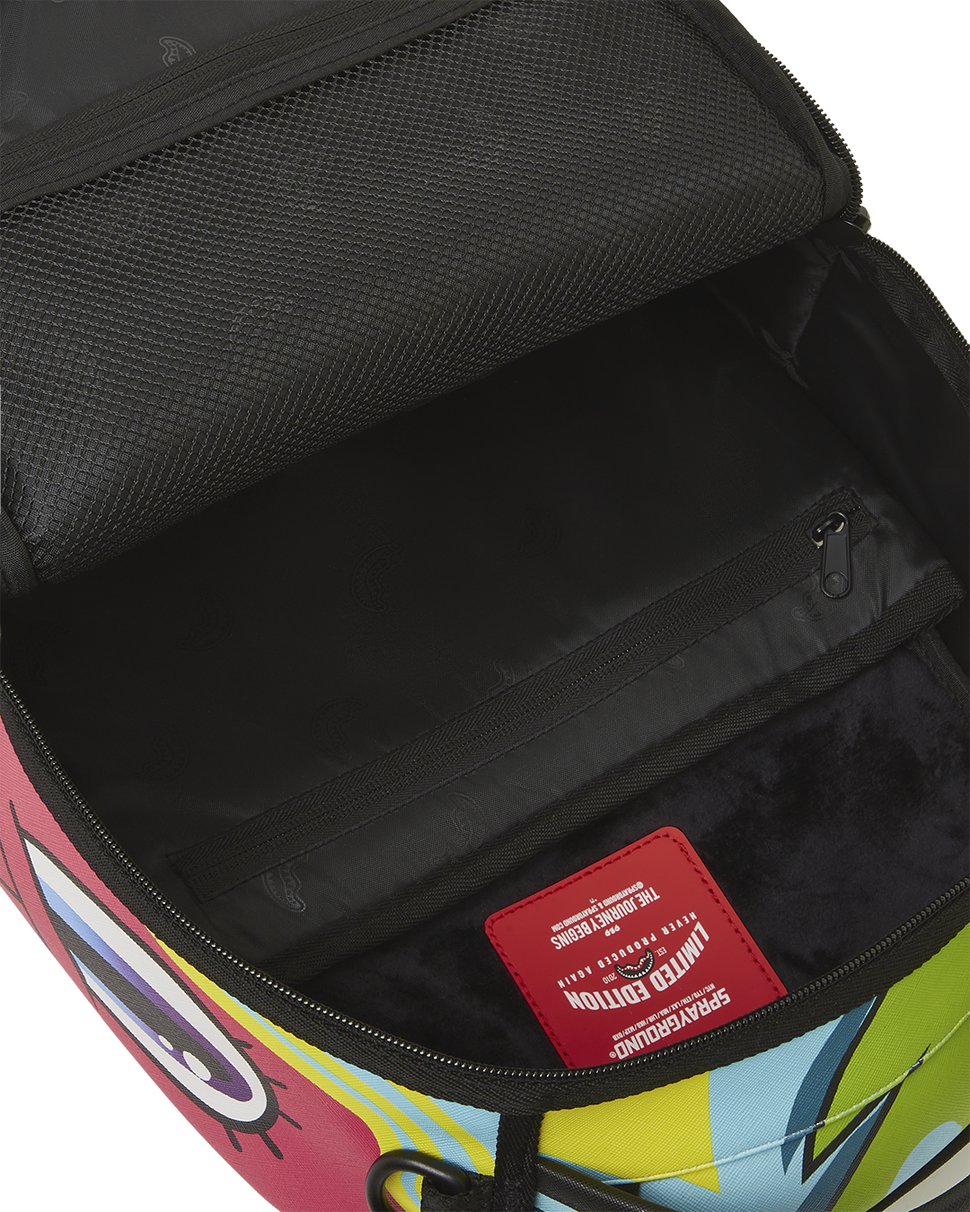 SPRAYGROUND® BACKPACK TRIPPY TAFFY BACKPACK (DLXV)