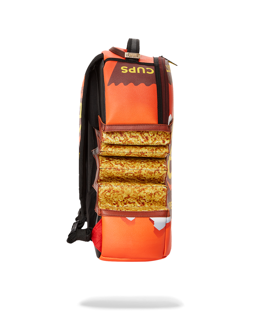 SPRAYGROUND® BACKPACK REESE'S SHARK BITE BACKPACK (DLXV)