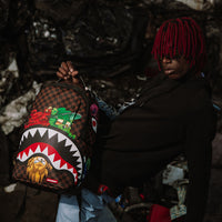 SPRAYGROUND® BACKPACK SHARKS IN PARIS CHARACTERS SNEAKIN BACKPACK (DLXV)