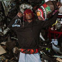 SPRAYGROUND® BACKPACK SHARKS IN PARIS CHARACTERS SNEAKIN BACKPACK (DLXV)