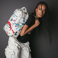 SPRAYGROUND® BACKPACK SHARKS IN PARIS GLITCH RIDER BACKPACK (DLXV)