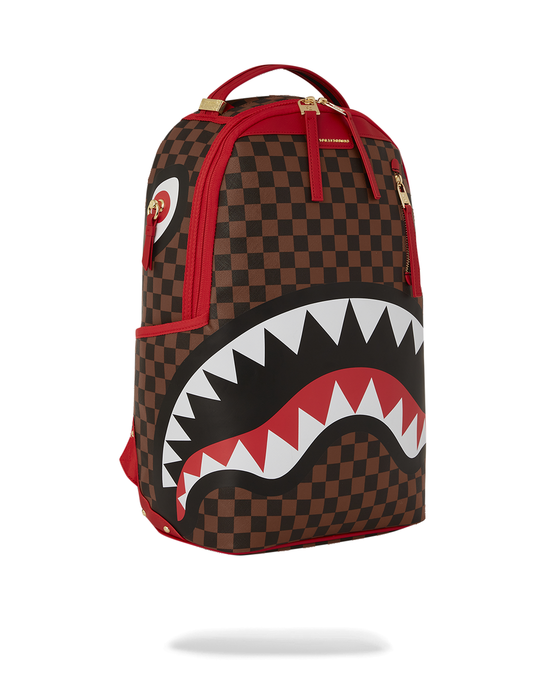 Sprayground sharks in Paris gold drip backpack