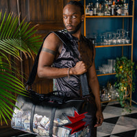 SPRAYGROUND® DUFFLE $HARKBITE LARGE DUFFLE