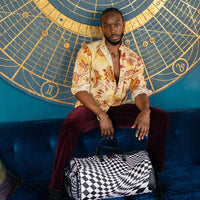 SPRAYGROUND® DUFFLE TRIPPY CHECK DUFFLE