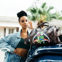 SPRAYGROUND® MINI DUFFLE MONEY CHASER MINI DUFFLE