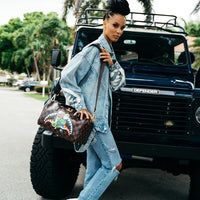 SPRAYGROUND® MINI DUFFLE MONEY CHASER MINI DUFFLE