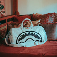 SPRAYGROUND® DUFFLE SPLIT THE CHECK (PEARL) DUFFLE