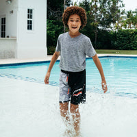 SPRAYGROUND® SWIM KIDS DAMAGE CONTROL SWIM TRUNKS