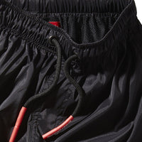 SPRAYGROUND® SWIM KIDS LIGHTS OUT SWIM TRUNKS